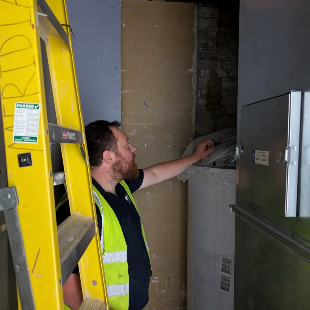 DMA Installing Hot Water Cylinder for New Offices