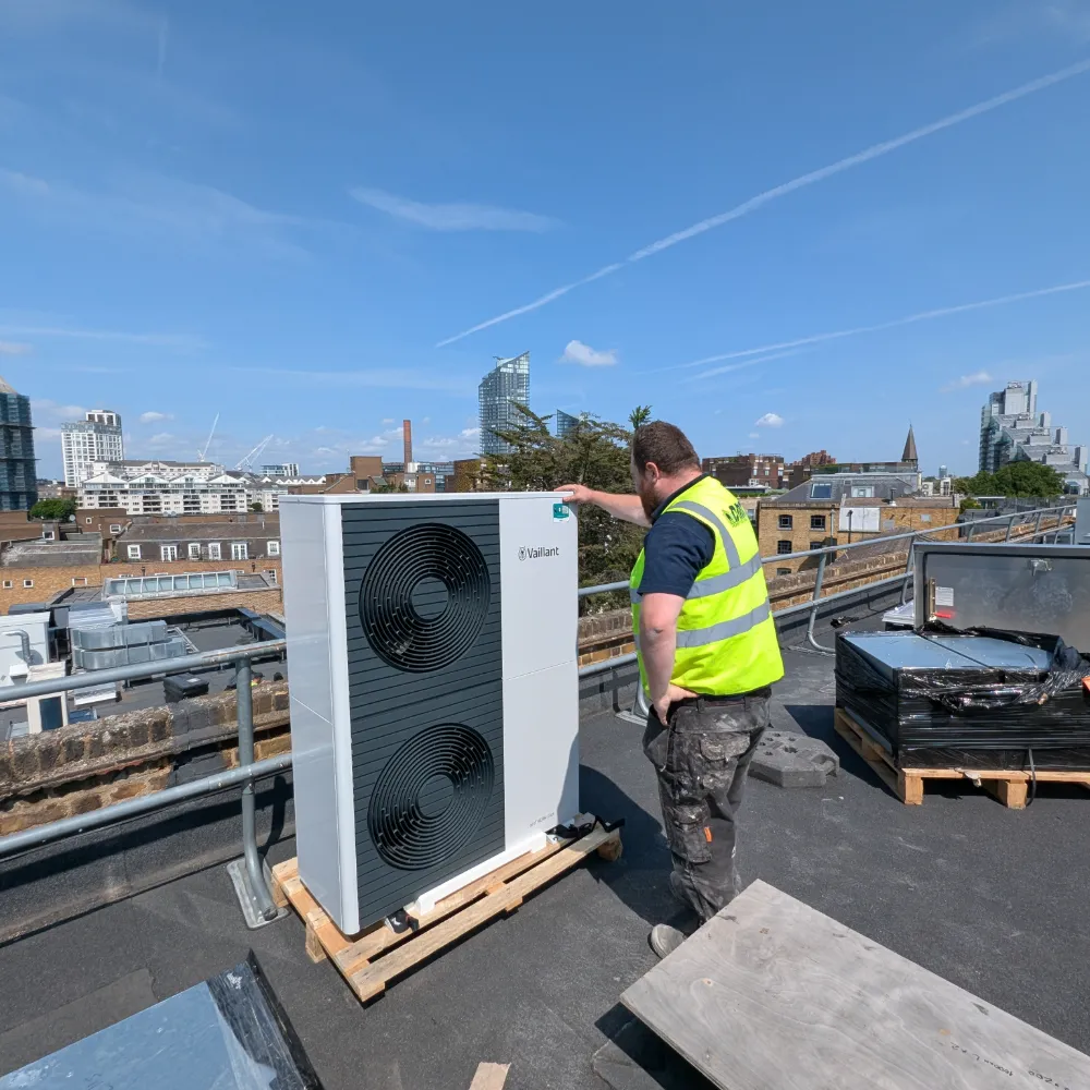 DMA Installing Open Air Heat Pump on Office Rooftop