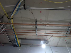 Wimbledon Development Copper Pipework Ceiling Installation